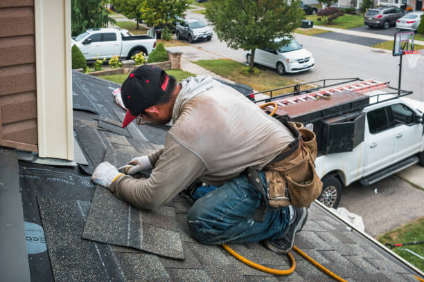 Professional Emergency Roof Repair technician working in Randall, IA